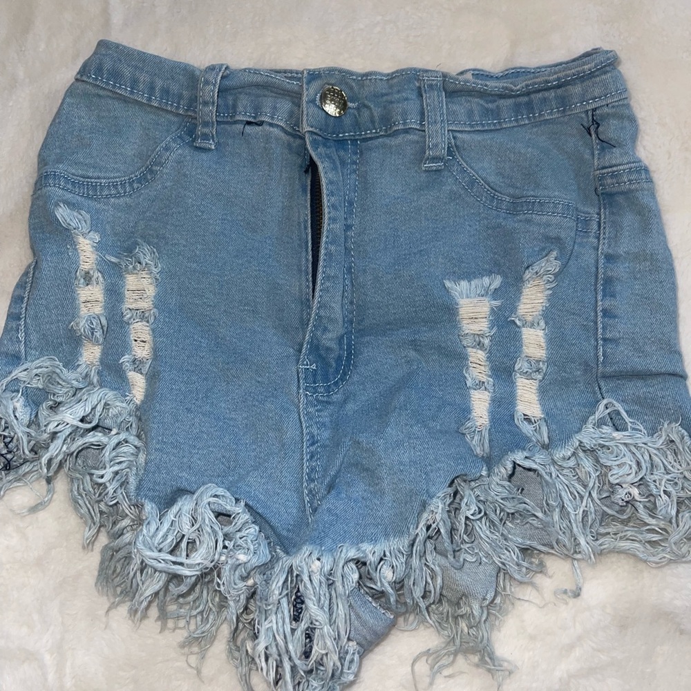 High waisted Ripped Jean shorts!! Size medium!